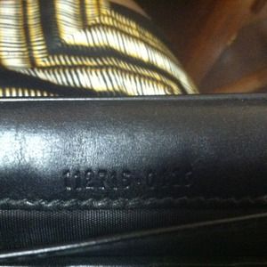 gucci wallet serial number location